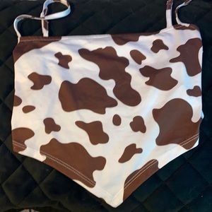 Brown and white cow patterned crop top.